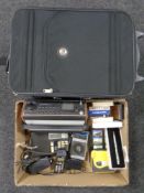 A cabin case and a box containing radios by Roberts, Sony, Realistic, Nokia mobile phone, Walkman,