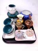 A tray of nineteen pieces of Denby Green Wheat tea china together with a miniature copper kettle,