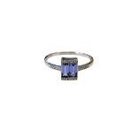 A 9ct white gold tanzanite baguettes and diamond ring, size O/P.