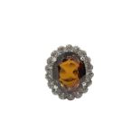 An 18ct white gold garnet dress ring, size P.