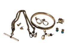 A collection of yellow metal and gold plated jewellery to include watch chain, bangle, earrings,