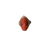 An antique gold coral cameo ring