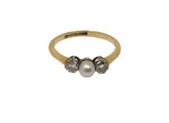 An 18ct gold pearl and diamond ring, size P. CONDITION REPORT: 2.4g.