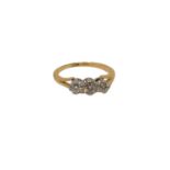 An antique 18ct gold platinum three stone diamond ring, size I CONDITION REPORT: 2.