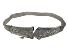 An ornate Indian silver belt CONDITION REPORT: Clasp requiring attention.
