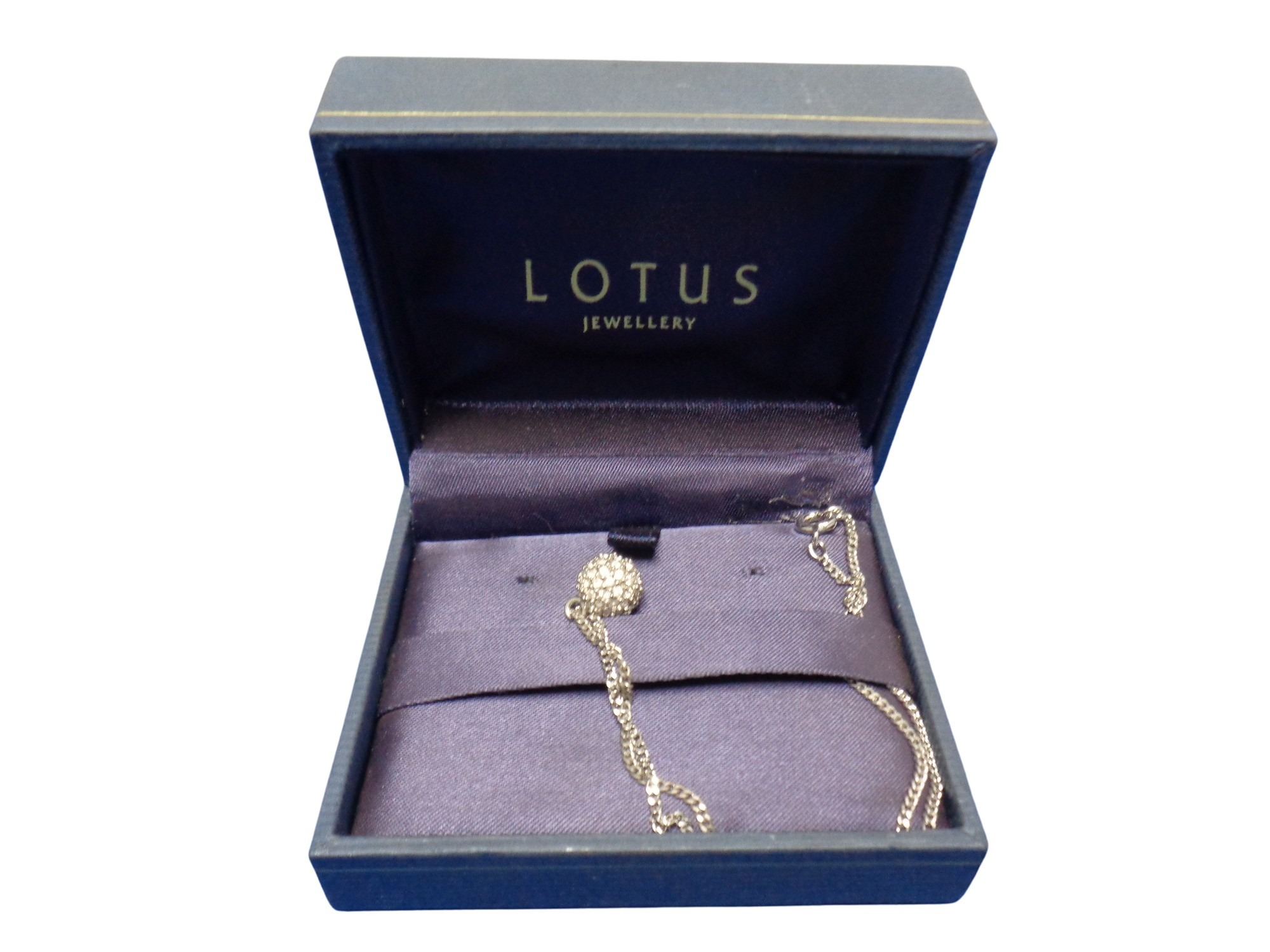 A Lotus Jewellery pendant on chain