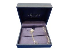 A Lotus Jewellery pendant on chain