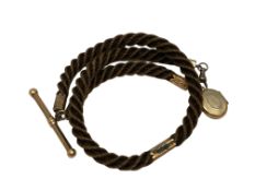 An antique hair Albert chain with gold T-bar, dog-catch and fittings.