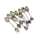 A collection of silver and enamel Scottish, Welsh spoons, Glasgow, Forfar, Dumfries, Edinburgh,