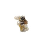 An 18ct gold pearl and diamond abstract ring, size G CONDITION REPORT: 14.