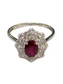 A ruby and diamond fancy cluster ring, approximately 0.81ct, ruby 1.03ct, size N/O.