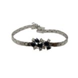 An 18ct white gold sapphire and diamond bracelet, approximately 1ct of diamonds, length 17.5cm.