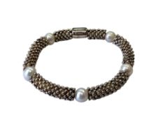 A silver Links of London Effervescence Star white pearl bracelet