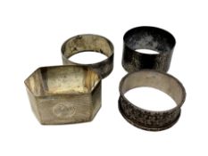 Four assorted silver napkin rings CONDITION REPORT: 91.