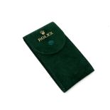 A vintage Rolex watch pouch serial number 50006036.