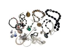 A collection of silver and white metal jewellery (Q)