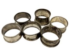 Six assorted silver napkin rings CONDITION REPORT: 73.