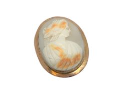 An antique rose-gold cameo brooch, 43 mm x 54 mm.