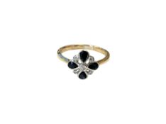 A 9ct yellow gold sapphire and diamond flower cluster ring, size N.