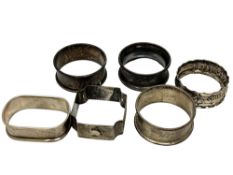 Six assorted silver napkin rings CONDITION REPORT: 55.