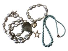 Three strand of pearls,