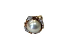A 14ct gold mabe pearl and diamond ring CONDITION REPORT: 6.