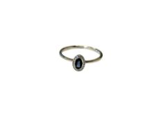 A 9ct white gold sapphire and diamond cluster ring, size M/N.