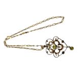 An antique gold peridot pendant and chain