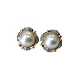 A pair of 14ct gold mabe pearl earrings CONDITION REPORT: 11.
