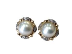 A pair of 14ct gold mabe pearl earrings CONDITION REPORT: 11.