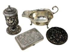 A silver compact, sauce boat,