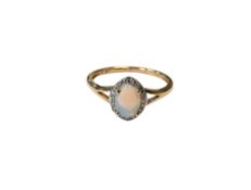 A 9ct gold opal and diamond cluster ring, size M/N.