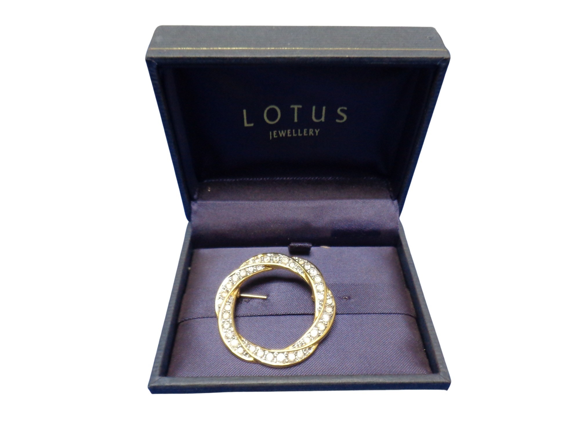 A Lotus Jewellery circular entwined brooch