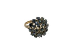 A 14ct gold sapphire cluster ring (one stone deficient),