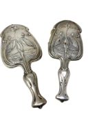 A fine quality Art Nouveau brush and hand mirror depicting kingfishers