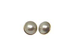 A pair of yellow gold mounted mabe pearl earrings CONDITION REPORT: One lacks post