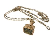 An antique style fob on gold plated chain