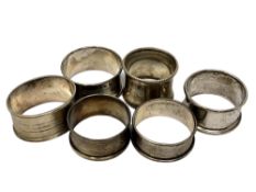 Six assorted silver napkin rings CONDITION REPORT: 92.