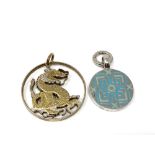 A sterling silver and enamel pendant together with a fine silver gilt pendant.