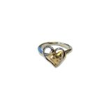 A 9ct yellow and white gold heart shaped ring, size M.