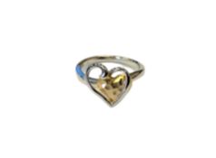 A 9ct yellow and white gold heart shaped ring, size M.