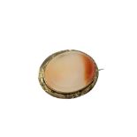 An antique agate brooch in gold mount