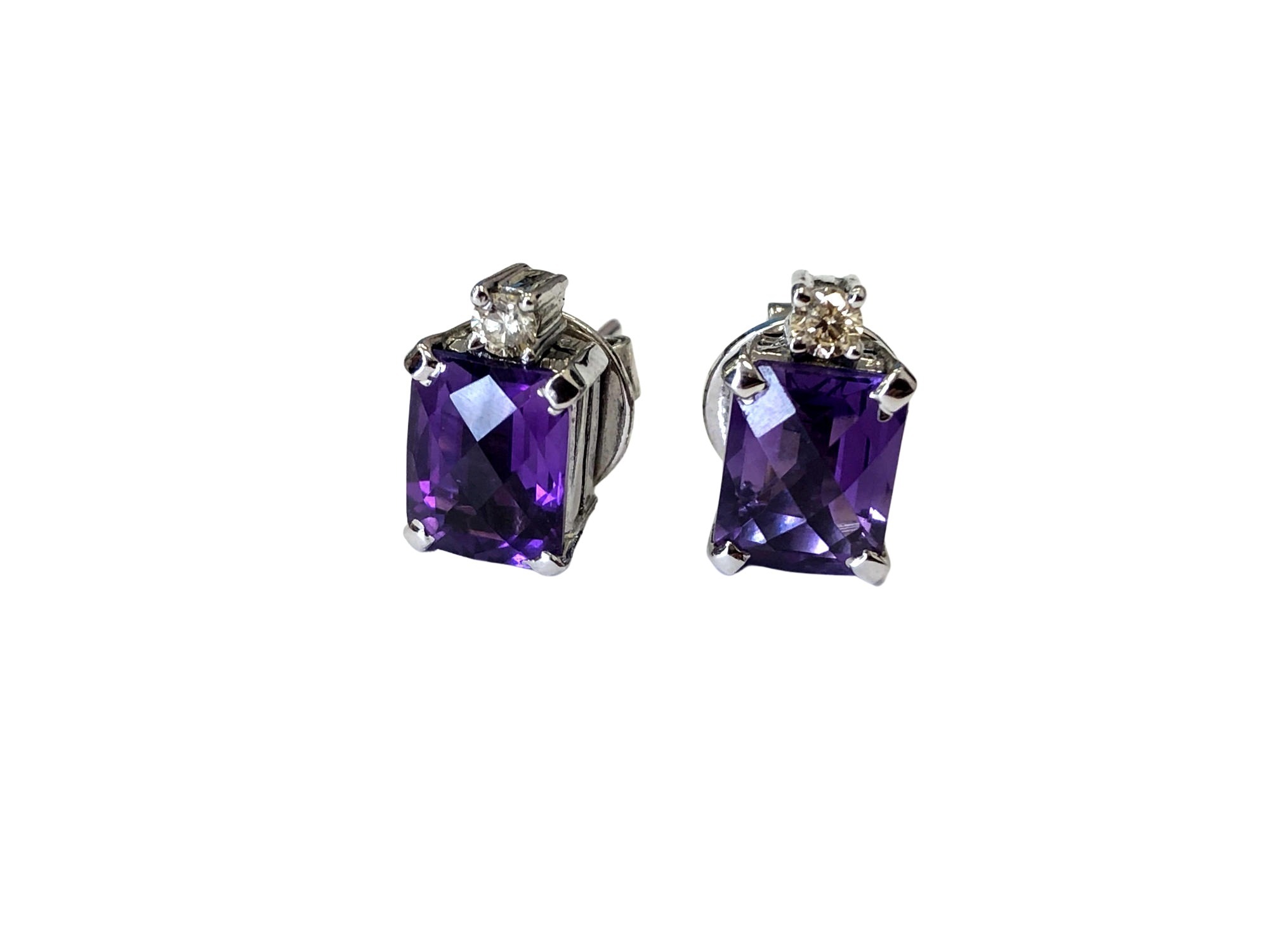 A pair of 18ct gold amethyst and diamond earrings CONDITION REPORT: 5g