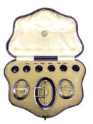 A fine quality cased silver gilt and purple enamel buckle, pair of shoe buckles, and six buttons,