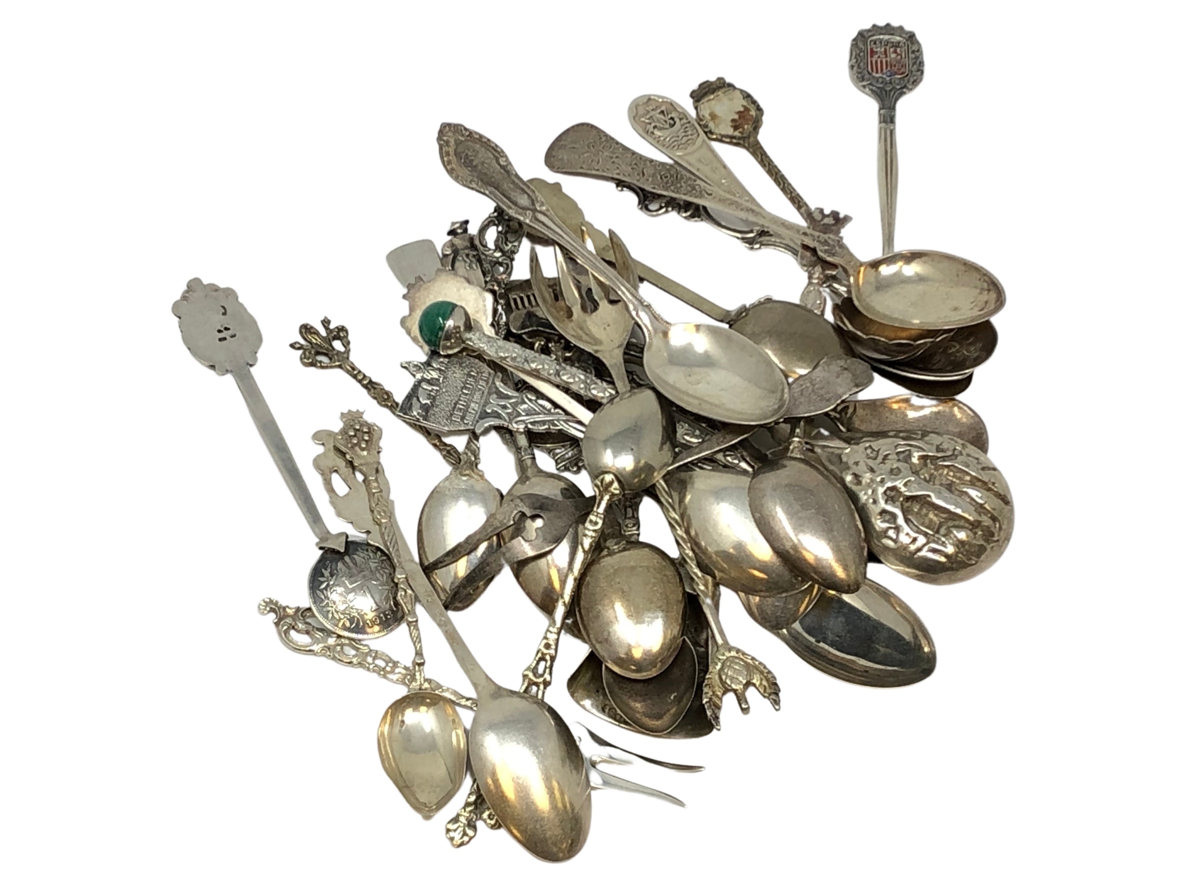A collection of various items of silver cutlery