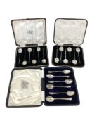 A boxed set of six silver teaspoons and two boxed sets of six silver coffee spoons