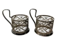 Two Russian white metal cup holders marked Hommet