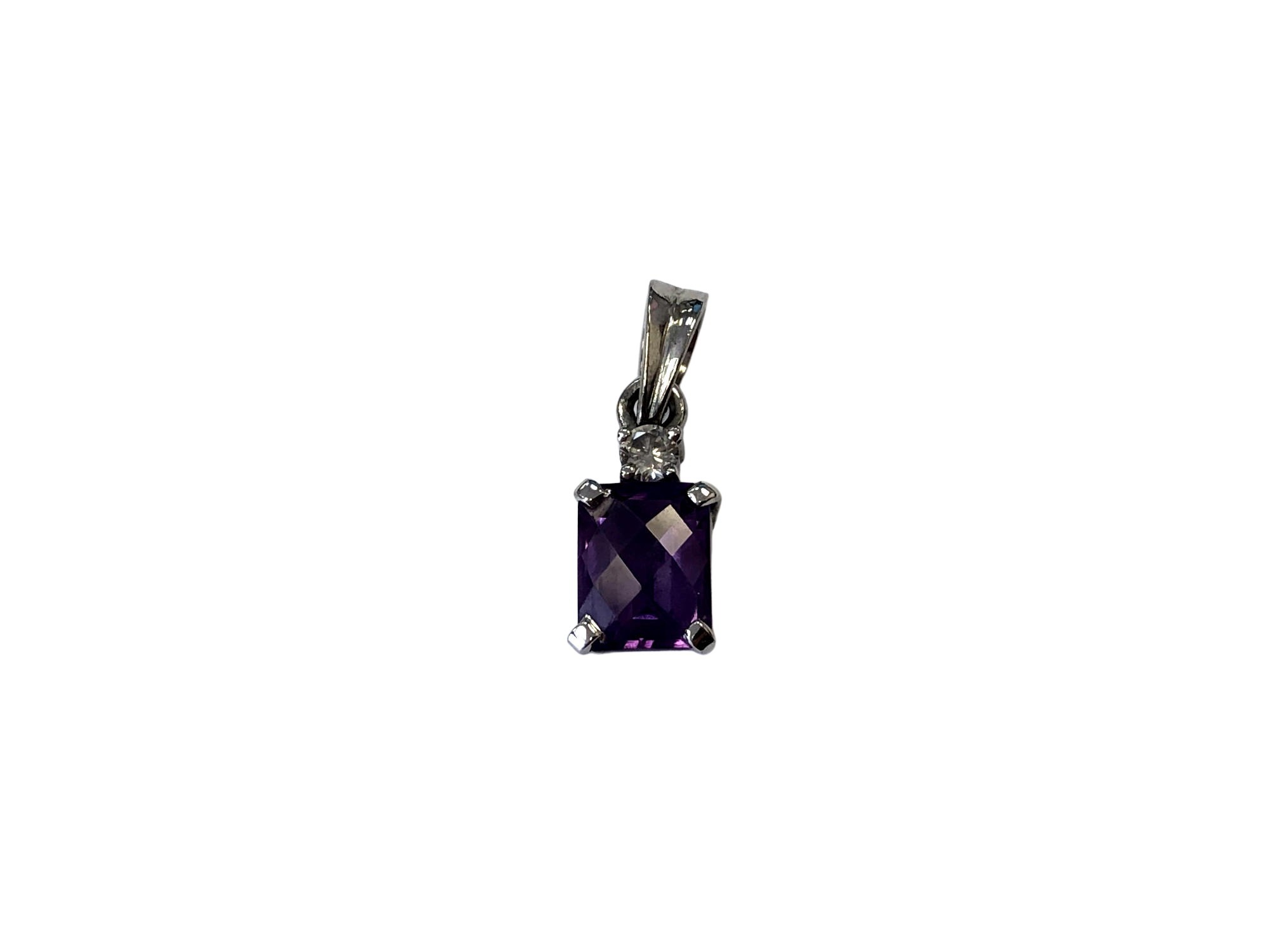 An 18ct white gold amethyst and diamond pendant