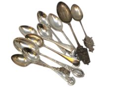 A collection of silver rifle and regimental spoons