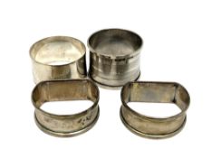 Four assorted silver napkin rings CONDITION REPORT: 74.